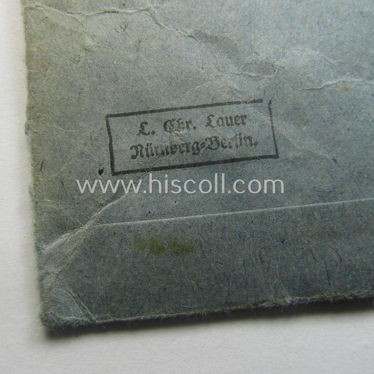 Matching 'EK II. Klasse'-set comprising of a non-maker-marked specimen that comes with its ribbon (ie. 'Bandabschnitt') and 'Zellstoff'-based pouch as was produced by the company: 'L.Chr. Lauer' (ie. 'Hersteller 14') — image 5