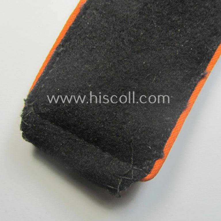 Single, Waffen-SS, EM-type shoulderstrap as piped in the bright-orange-coloured branchcolour as was intended for usage by an: 'SS-Mann' who served within the: 'SS-Feldgendarmerie-Trpn.' — image 2