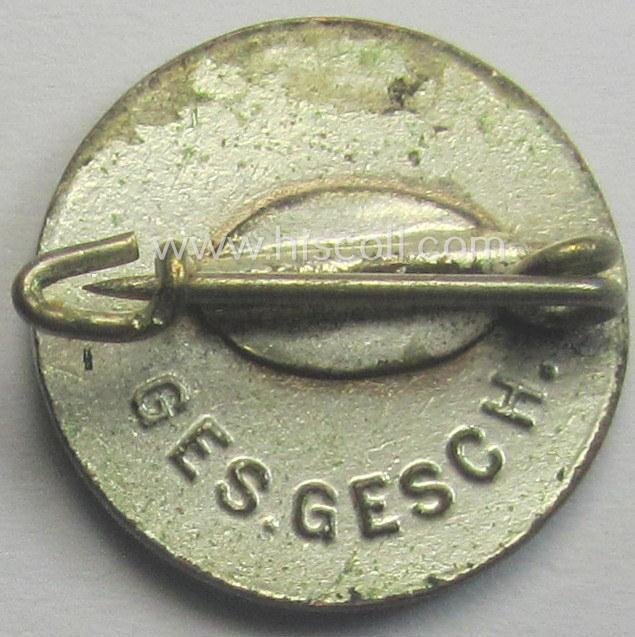Multi-coloured, DRK (ie. 'Deutsches Rotes Kreuz') civil-attire badge (ie. 'Zivilabzeichen des D.R.K.') being a very detailed example that is void of a makers'-mark but that shows a: 'Ges.Gesch.'-patent-designation — image 2