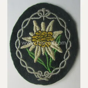 WH (Heeres) EM- (ie. NCO-) type: 'Edelweiss'-armpatch (being a machine-embroidered …