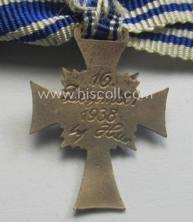 Miniature of an: 'Ehrenkreuz der deutschen Mutter - zweite Stufe' (or: silver-class mothers'-cross) being a non-maker-marked example that comes in an overall nice- (albeit moderately worn- ie. used-), condition — image 4