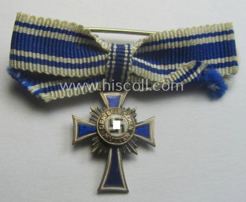 Miniature of an: 'Ehrenkreuz der deutschen Mutter - zweite Stufe' (or: silver-class mothers'-cross) being a non-maker-marked example that comes in an overall nice- (albeit moderately worn- ie. used-), condition — image 5