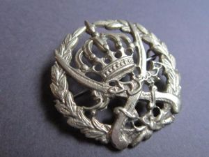 British/local made 'white metal 'sand cast' Arab Legion head-dress badge
