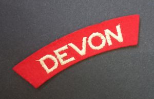 A nice - un-issued standard embroided - Devonshire Regiment shoulder …