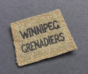 A early Canadian made Winnipeg Grenadiers slip-on shoulder title