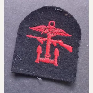 A perfect - left facing - single embroided Combined Operation …