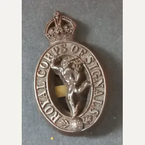 A attractive Royal Corps of Signals brown plastic cap badge