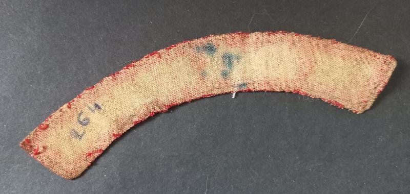 A nice and issued (regrettably missing its black backing) The King's Regiment printed shoulder title — image 2