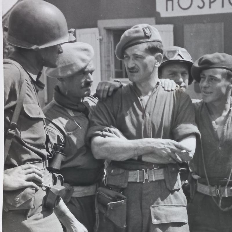 A attractive official US Signal Corps 'Press Release' (large 25.9cm x 20.2cm) photograph showing British S.A.S. (Special Air Service) troops after Operation HAFT meeting up with American troops some were in France — image 4