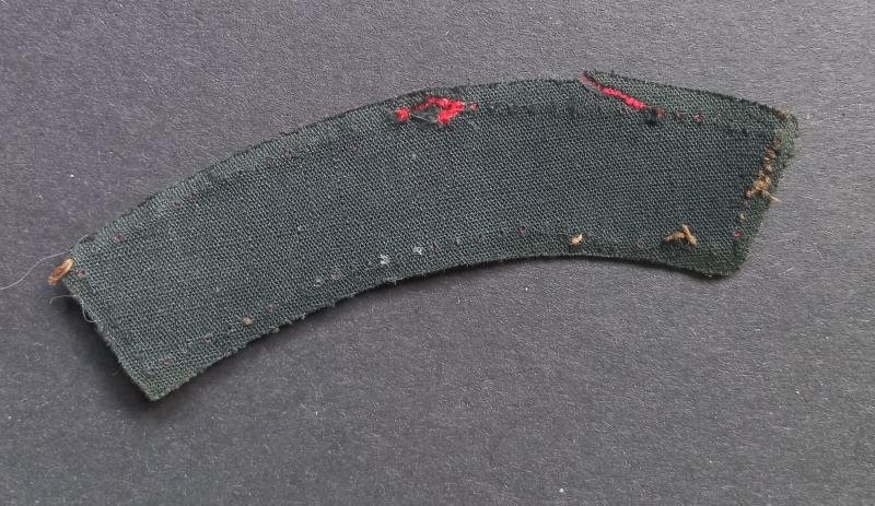 A attractive (unfortnately damage) printed C.M.P. (Corps of Military Police) shoulder title — image 2