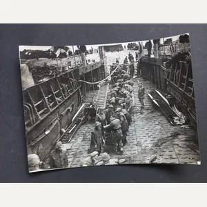 A superb official 'Press Release' photograph showing British Troops during …