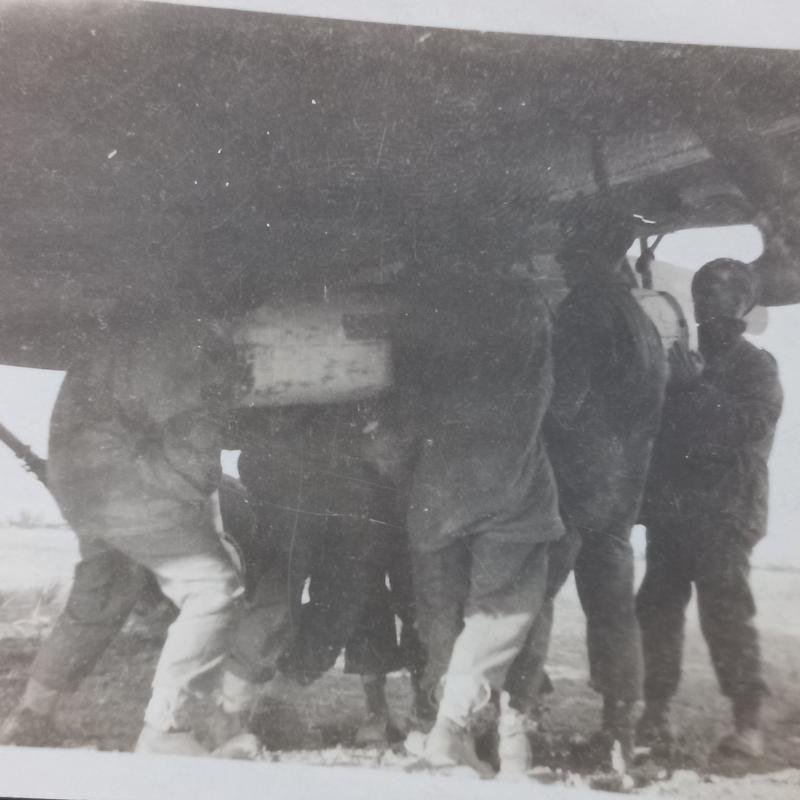 A original and - regrettably small 8.6cm by 6.3cm - period made black and white photograph dispicting men of a Airborne unit loading containers — image 3