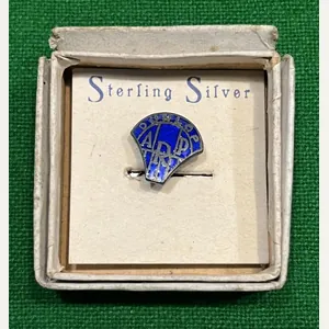 Boxed Dunlop ARP lapel badge.