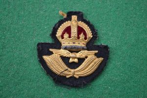 R.A.F. cap badge.