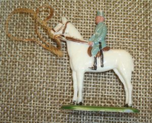 WWII GERMAN POLICE ON HORSE TINNIE