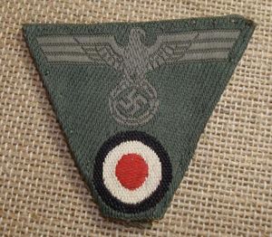 WWII GERMAN EM/NCO'S M43 TRAPEZOID CAP INSIGNIA