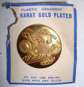 WWII ARMY CAP BADGE IN PLASTIC ON CARD