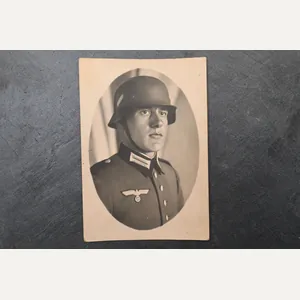 postcard of a Wehmacht soldier with a helmet