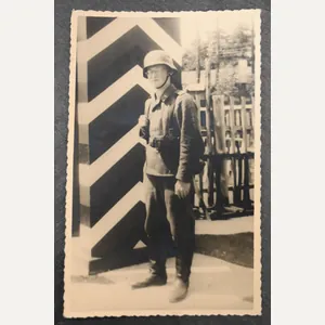 Luftwaffe postcard with helmet