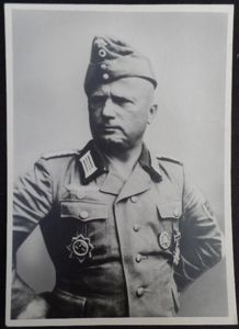 Officer 'Krim' veteran with DKiG.