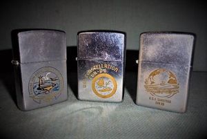 THREE ZIPPO LIGHTERS S/N883