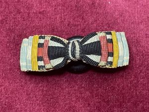 Very special buttonhole decoration for 6 awards (70 years of …