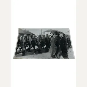 press photo with Knight Cross