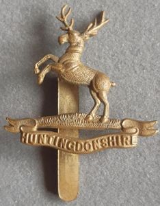 BRITISH - The Huntingdonshire Cyclist Battalion G/M Hat Badge (KK1870)