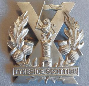 BRITISH - Tyneside Scottish (Northumberland Fusiliers) White Metal Hat Badge