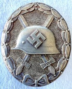 POST WW2 PRODUCED GERMAN SILVER WOUND BADGE - MARKED L/14