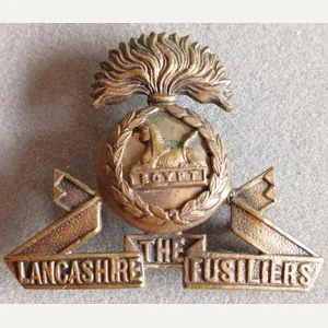 BRITISH - Lancashire Fusiliers Bronze Hat Badge (KK618)