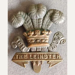 BRITISH - The Leinster Regt. Bi-Metal Hat Badge (KK 700)
