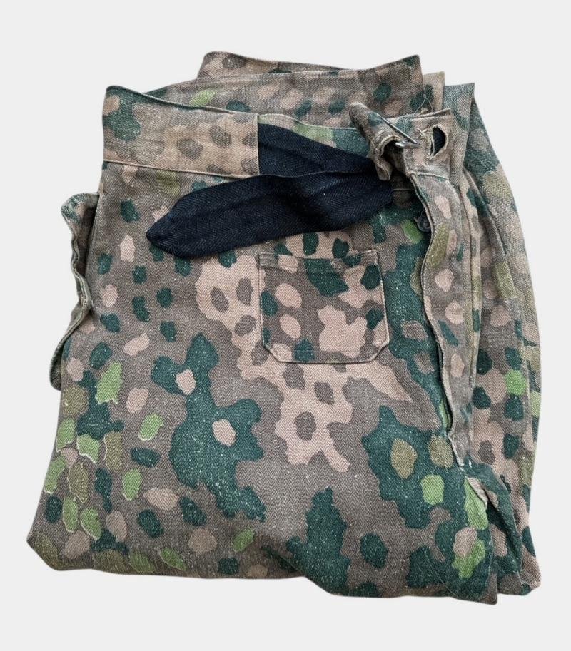 A rare Waffen-SS dot camouflage pattern (HBT) Panzer trousers. — image 17