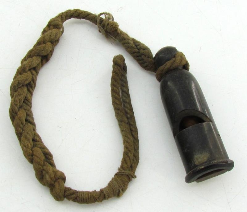 Wehrmacht issue signal whistle with lanyard