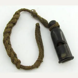 Wehrmacht issue signal whistle with lanyard