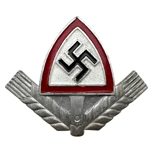 Original WWII German Reichsarbeitsdienst metal cap insignia
