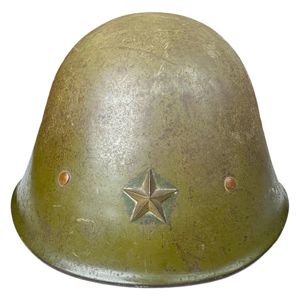 Original WWII M41 KNIL helmet captured by the Japanese army