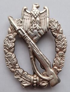 Early hollowback tombak Infantry Assault Badge by Schickle/Mayer.