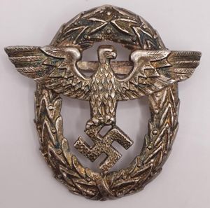 Early 2 part tombak Police Eagle by Assmann.