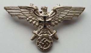 Early Old Comrades cap eagle.