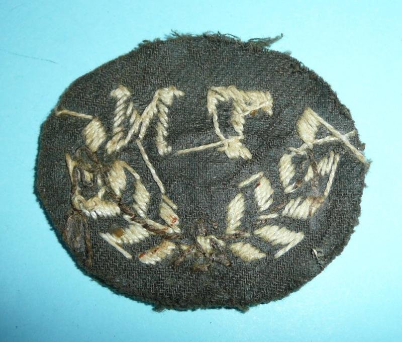 WW2 / Cold War TM Tank Mechanic Unofficial Woven White on Khaki Proficiency Trade Arm Badge — image 2