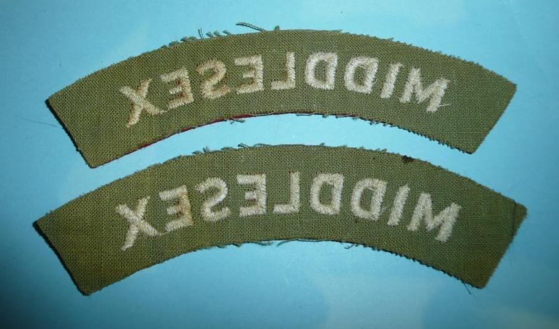 Middlesex Regiment Pair of Woven White on Red Felt Cloth Shoulder Titles — image 2