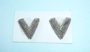 A small pair of silver bullion thread volunteer force officers …