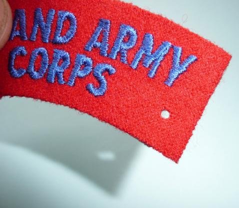 Royal New Zealand Army Ordnance Corps Embroidered Blue on Red Felt Cloth Shoulder Title — image 2