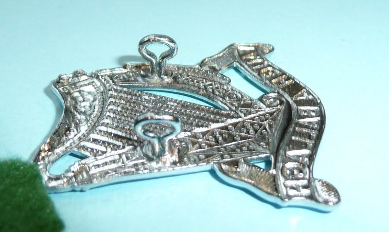 South African Irish Regiment Chromed Headdress Badge on Green Felt Badge Backing — image 4
