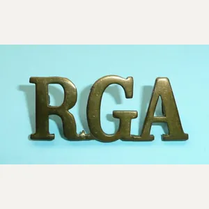 WW1 RGA Royal Garrison Artillery Brass Shoulder Title