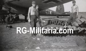 Original WW2 German Photo - Heinkel He 111 loading bombs …