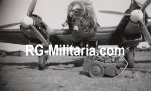 Original WW2 German Photo - Heinkel He 111 loading bombs …
