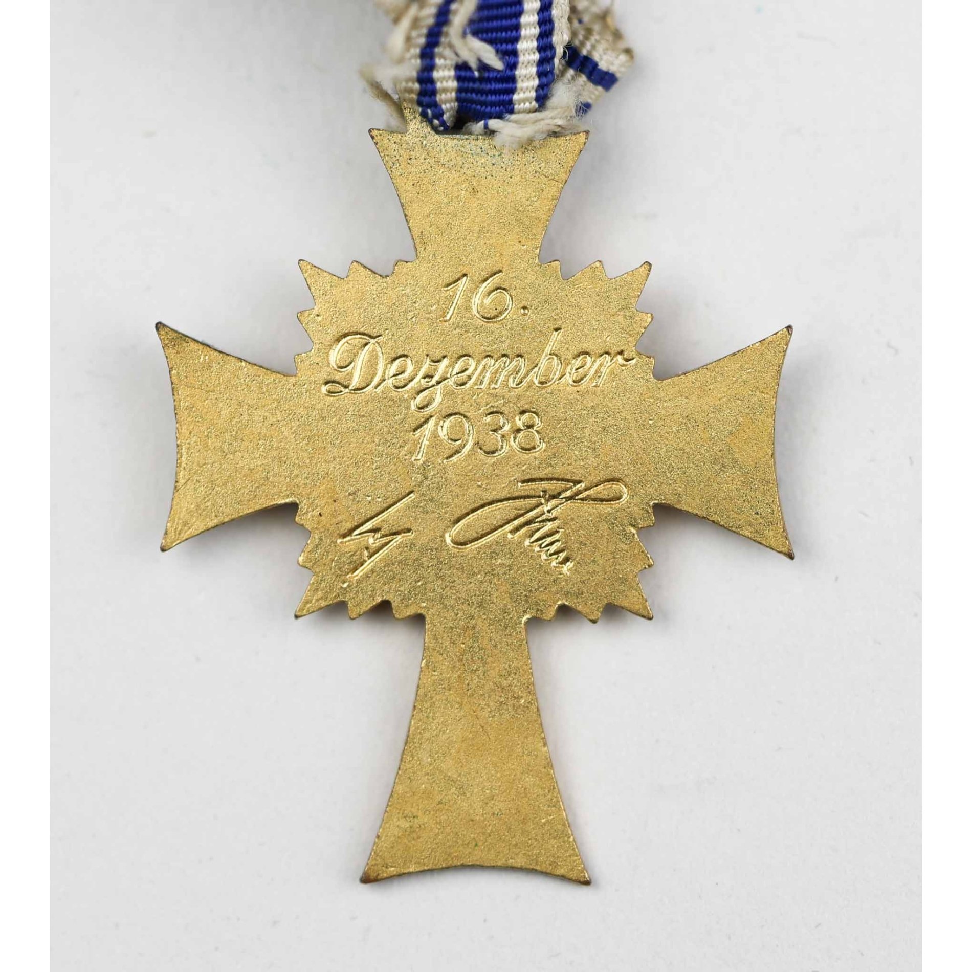Ehrenkreuz der Deutschen Mutter Mutterkreuz in Gold mit Hersteller F.Reischauer — image 3