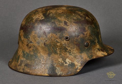 WWII German Model 1942 Camouflage Helmet with Battle Damage — image 11